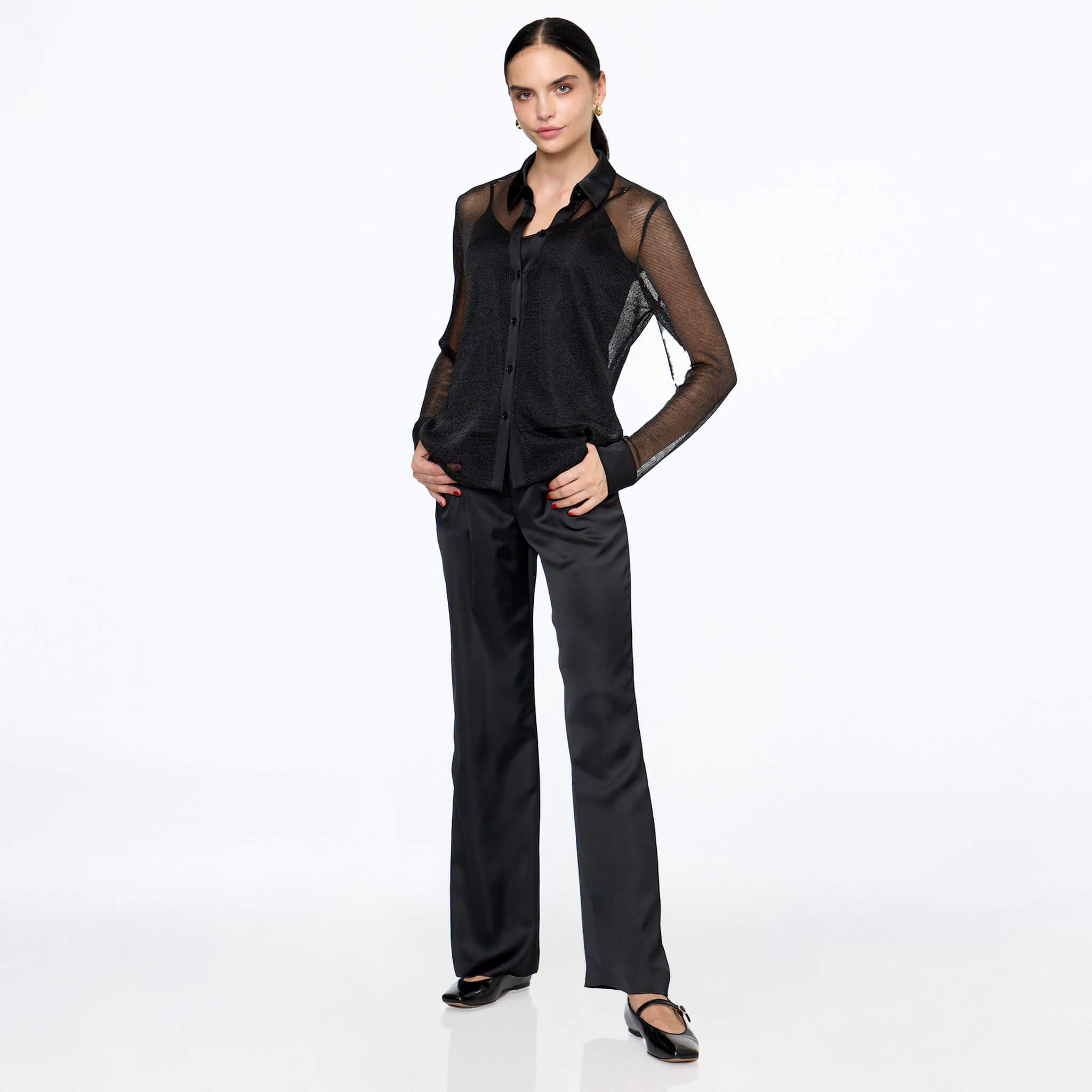 Camisola negra con combinaciones