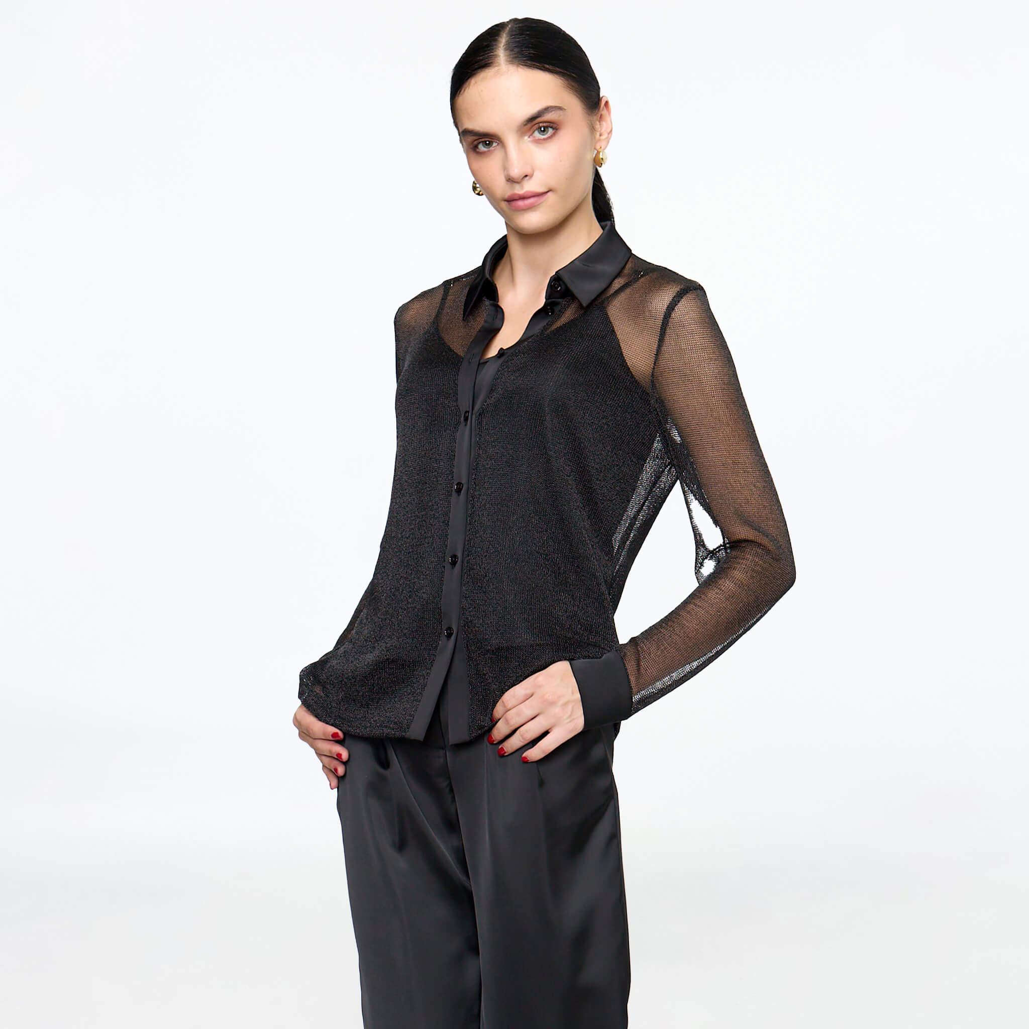 Camisola negra con combinaciones